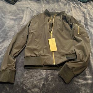 Albion black bomber jacket. Brand new with tags.